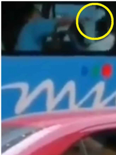 Hombre que limpia vidrio del MIO con tapabocas y luego se lo pone en la cara