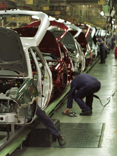 Trabajadores de Ford, que anunció el cierre de todas sus plantas en Brasil, la planta automotriz de Sao Bernardo do Campo, en Sao Paulo, en 1999.