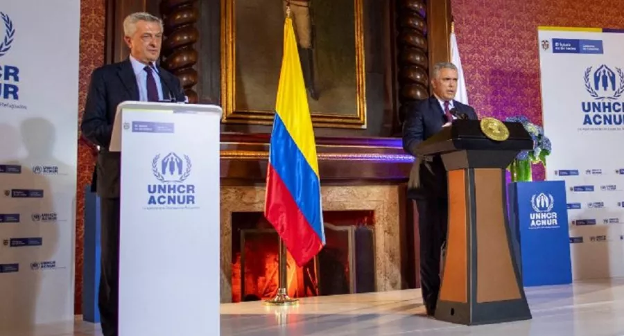 Iván Duque y el alto Comisionado ACNUR, Filippo Grandi, durante el anuncio de regularización de migrantes venezolanos en Colombia