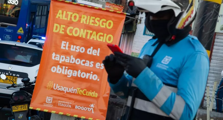 Aviso de alto riesgo de contagio de COVID-19 en Bogotá ilustra nota sobre nuevo sistema para decretar cuarentenas