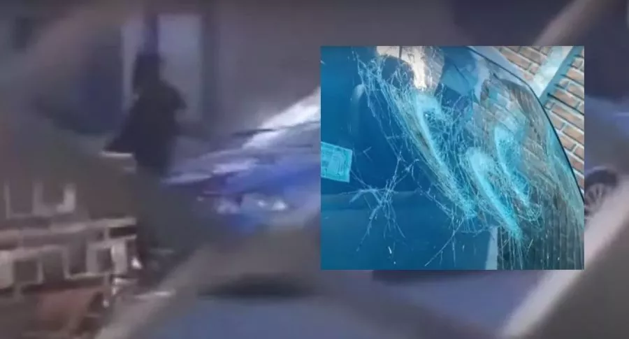 Captura de pantalla de video de despechada le destrozó el carro a su ex con un palo de golf, en Argentina