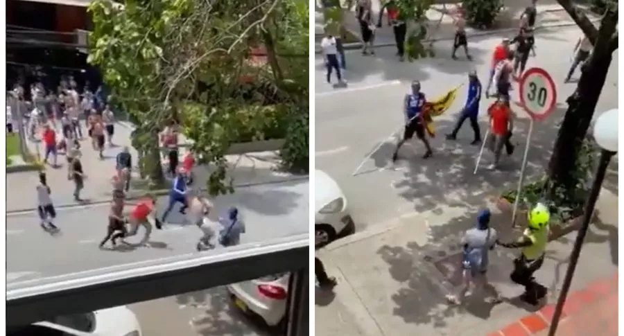Hinchas de Millonarios pelean al frente del hotel de concentración en Cali.