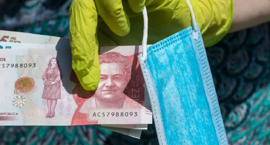Imagen de unos billetes colombianos, que ilustran información sobre reforma tributaria e Ingreso Solidario