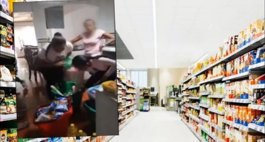 Imagen de familia en Cali que exhibe lo que habrían saqueado de supermercado, en disturbios por el paro nacional