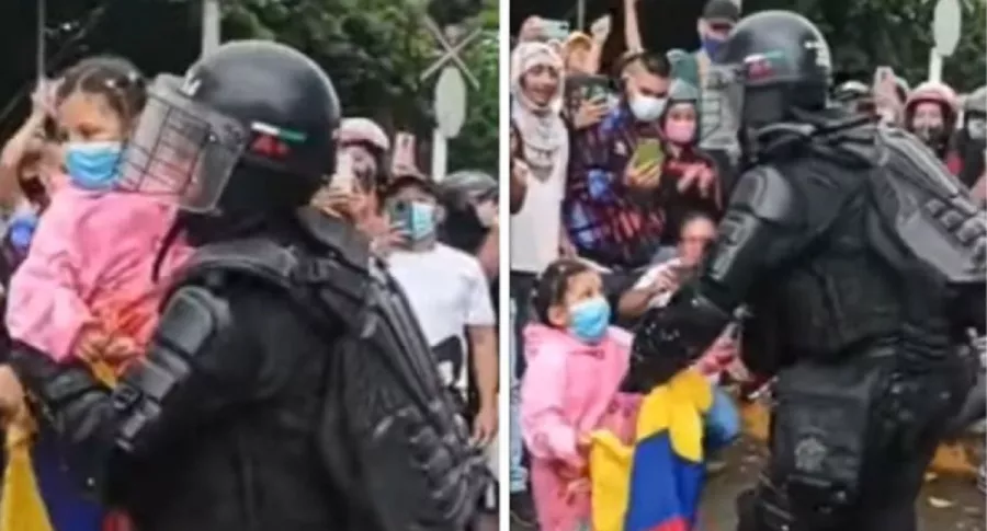 Video de niña entregándole la bandera de Colombia y abrazando a agente del Esmad durante manifestaciones en Buga, Valle del Cauca. 