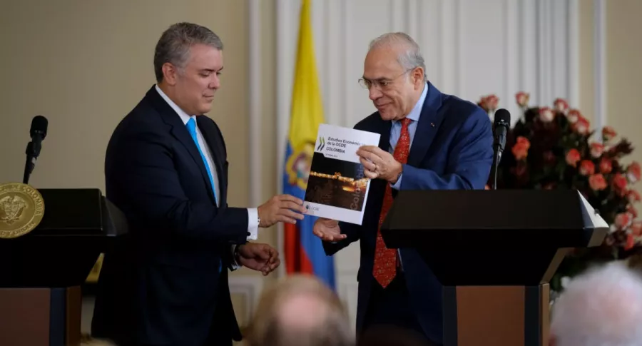 Iván Duque y José Angel Gurría, ilustra nota de Duque agradece a secretario general de OCDE por aplacar debates violentos