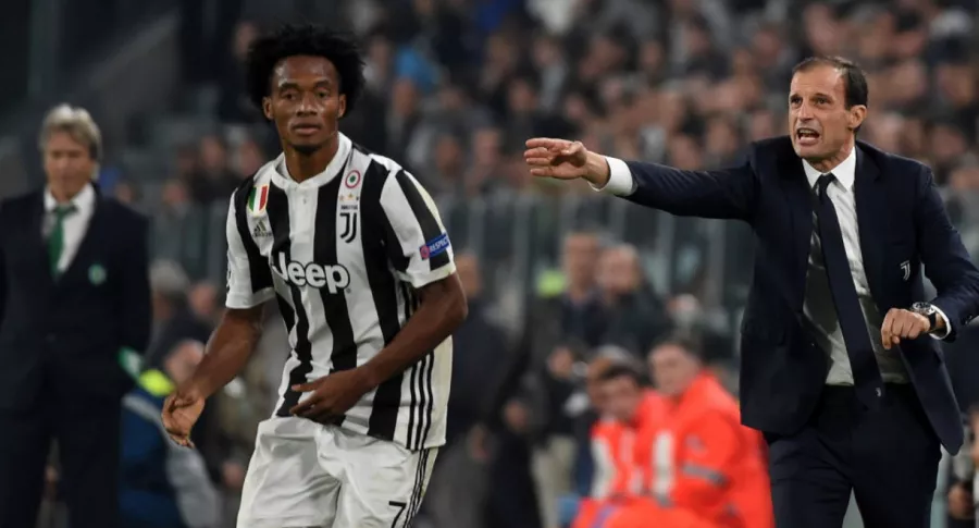 Juan Cuadrado y Massimiliano Allegri, quien regresa a la Juventus como técnico