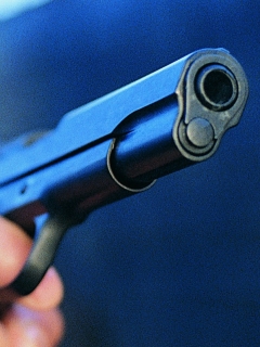 Imagen de pistola que ilustra nota; Medellín: atacan con arma de fuego a periodista en su casa
