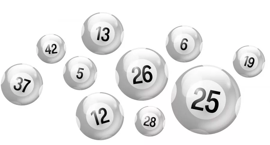 Balotas plateadas de diferentes números, ilustran qué lotería jugó anoche y resultados de las loterías de la Cruz Roja y Huila.