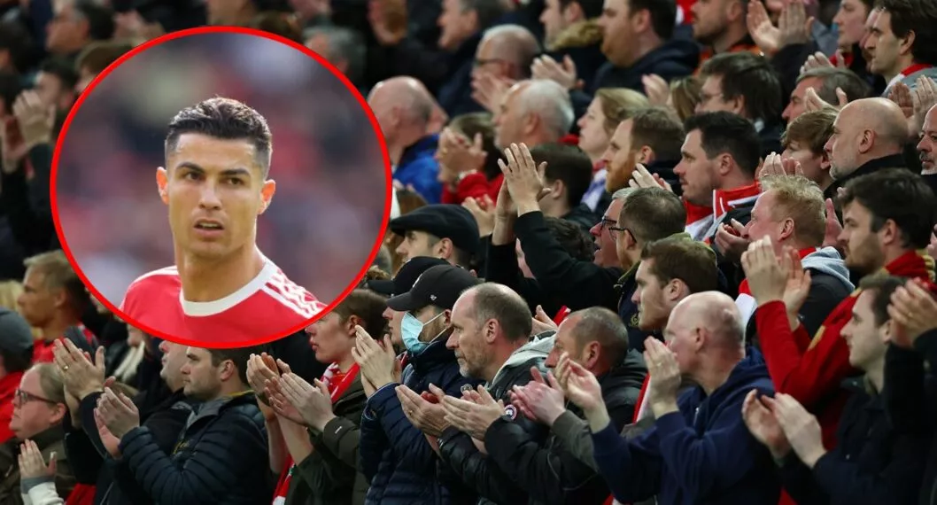 Cristiano Ronaldo e hinchas del Liverpool, que le hicieron homenaje por muerte de su hijo