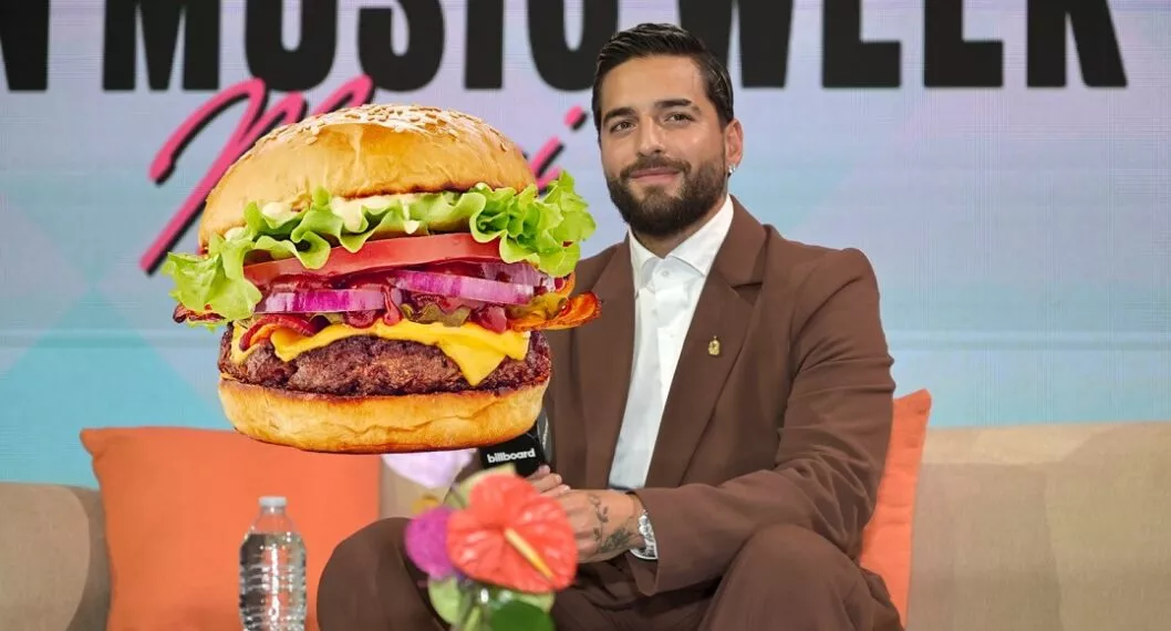Maluma junto a hamburguesa ilustra nota sobre cuánto valen las suyas