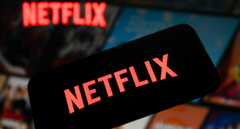 Netflix logo displayed on a phone screen and Netflix website displayed on a laptop screen are seen in this illustration photo taken in Krakow, Poland on July 14, 2022. (Photo by Jakub Porzycki/NurPhoto via Getty Images)