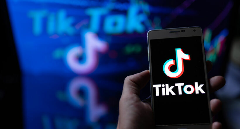 Photo illustration a TikTok logo seen displayed on a smartphone In Brussels - Belgium on 18 September 2022. (Photo illustration by Jonathan Raa/NurPhoto via Getty Images)