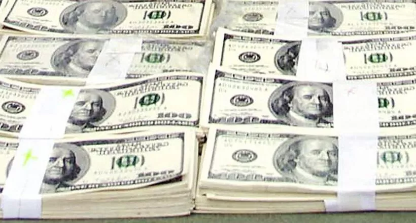 Dinero: imagen de referencia sobre robo a casas de dos fiscales en Bogotá; se llevaron millones en dólares y pesos
