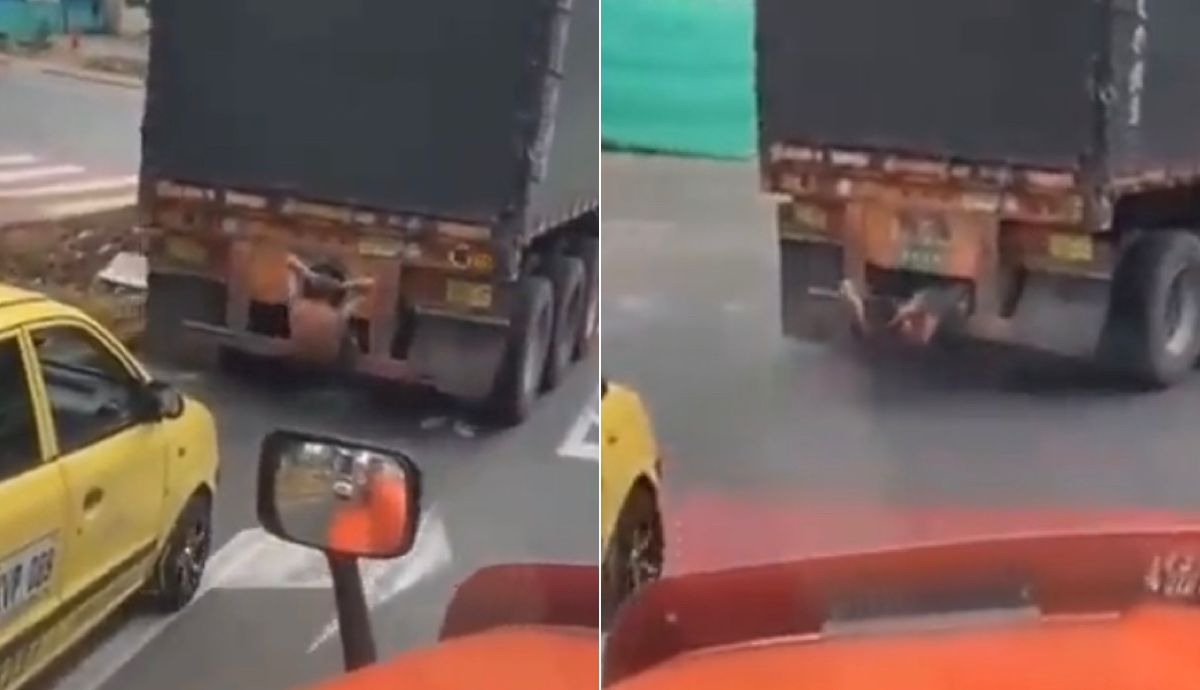 Hombre en Bucaramanga hizo abdominales colgado de la parte de atrás de un camión.