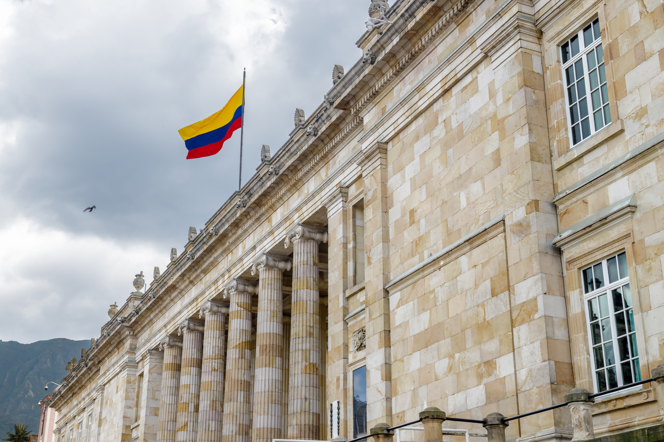 Colombian flag flies on the National Capitol building in Bogota