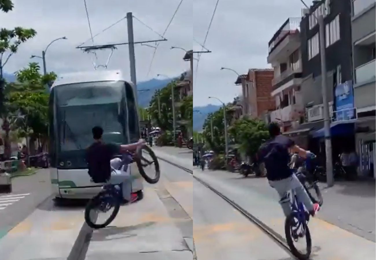 Un imprudente ciclista desata caos en Medellín al realizar peligrosas acrobacias, casi colisionando con el tranvía de la ciudad.