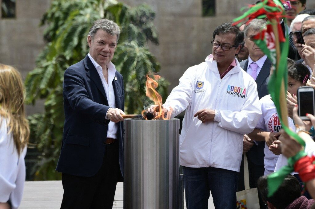 Juan Manuel Santos y Gustavo Petro. / AFP