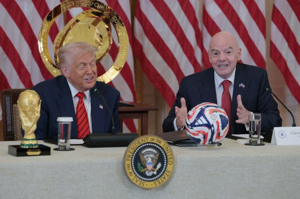 Donald Trump y Gianni Infantino / AFP