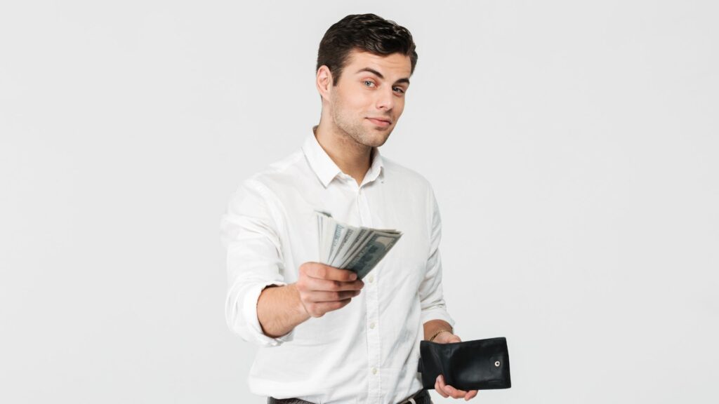 Trabajador con dinero / Freepik