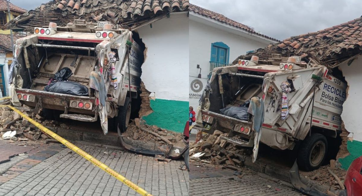 Camión recolector de basura se estrelló contra casa en La Candelaria en Bogotá hoy 17 de febrero y quedó incrustado en la vivienda.