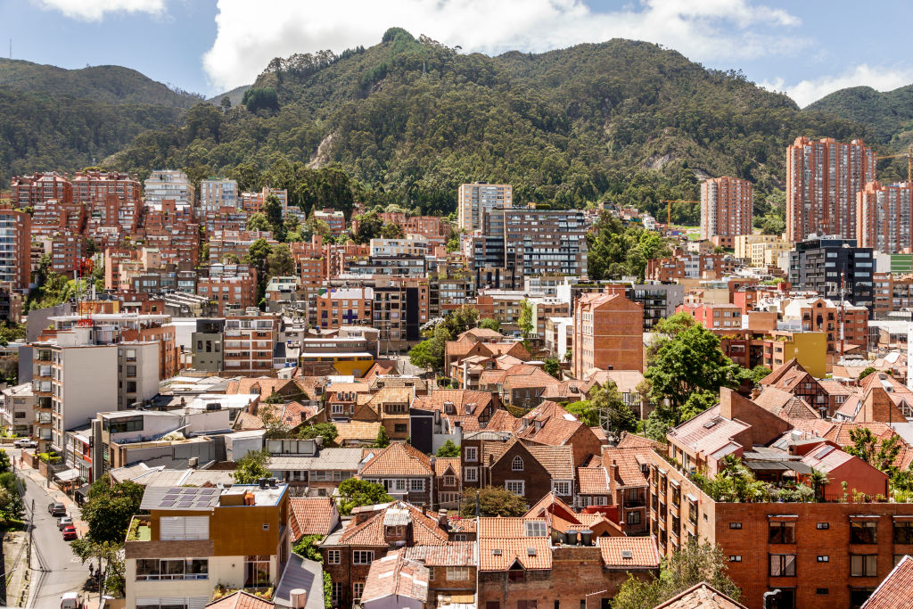 Bogota, Colombia, Chaperino Norte, panoramic city skyline rooftops houses buildings Eastern Hills Cerros Orientales. (Photo by: Jeffrey Greenberg/Universal Images Group via Getty Images)