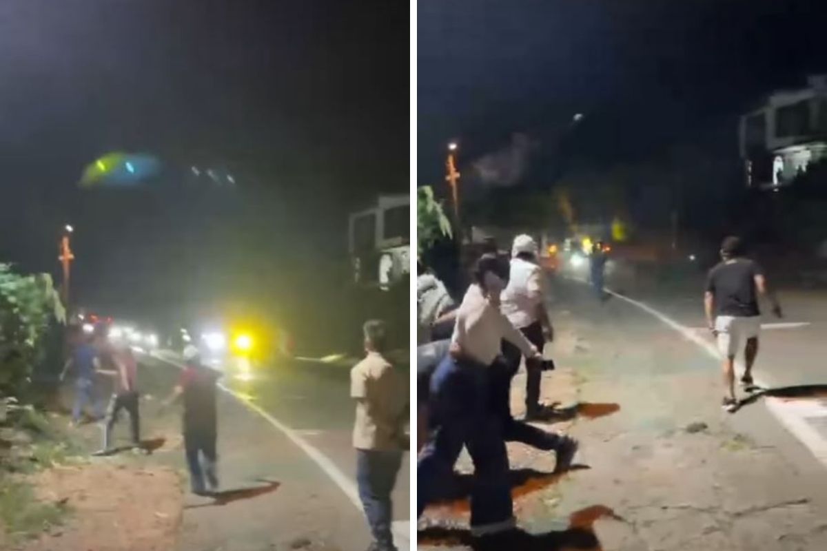Momento en el que unas personas lanzan piedras contra motociclistas en la vía Mosquera-La Mesa