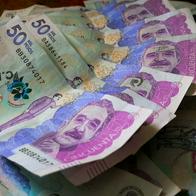 Foto de billetes colombianos de $ 50.000, a propósito del listado que reveló la Superfinanciera de bancos que más plata ganaron y perdieron