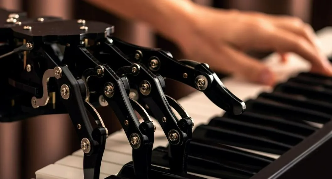 Persona tocando junto a un robot a propósito de cómo crear canciones con inteligencia artificial.