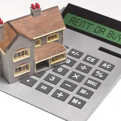 Casa y calculadora.