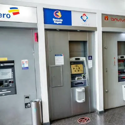 Bogota, Colombia, El Chico, BBVA Cajero Centro Commercial Portobelo ATM, Banco de Bogota Davivienda, man using ATM. (Photo by: Jeffrey Greenberg/Universal Images Group via Getty Images)