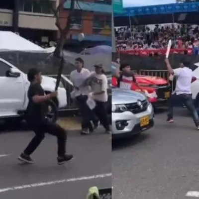 Momento en el que en un desfile del San Juan en Ibagué sujetos atacaron con machete