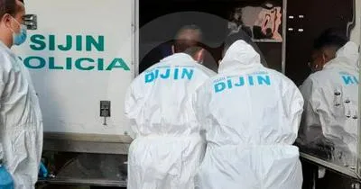 Agentes de la Sijin en levantamiento de cuerpo.