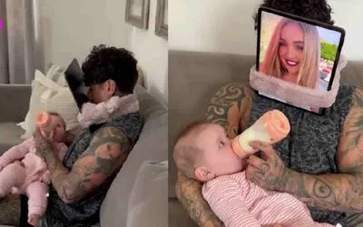 Captura de video de papá alimentando a su hija.