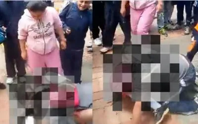 Capturas de video de riña entre estudiantes en Bogotá.