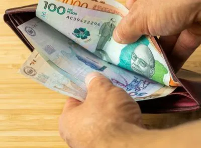 Dinero colombiano. En relación con subsidio en Bogotá.