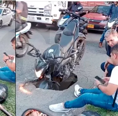 En video | Gigantesco hueco “se tragó” una motocicleta en la avenida Regional.