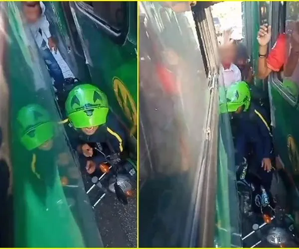 Imprudencia casi termina en tragedia: Motorista quedó atrapado entre dos buses por adelantar