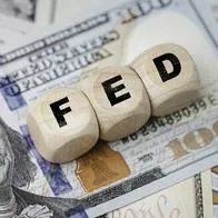 FED wording with up and down arrow on USD dollar banknote for Federal reserve increase and decrease interest rate control which effect to America and world economic growth concept.
