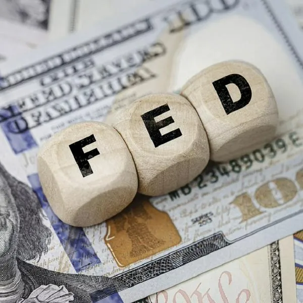FED wording with up and down arrow on USD dollar banknote for Federal reserve increase and decrease interest rate control which effect to America and world economic growth concept.
