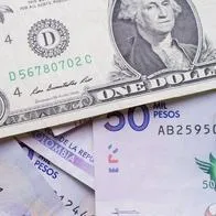 dollar bill over Colombian pesos, close up