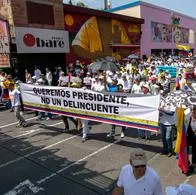 Demonstrators hold signs against Colombian president Gustavo Petro during the anti-government protests against the government and reforms of president Gustavo Petro, in Cali, Colombia, June 20, 2023. (Photo by: Sebastian Marmolejo/Long Visual Press/Universal Images Group via Getty Images)