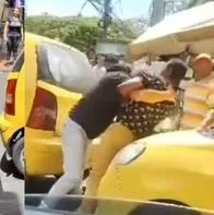 Taxistas protagonizaron violenta pelea en calle de Ibagué; hubo gritos y susto