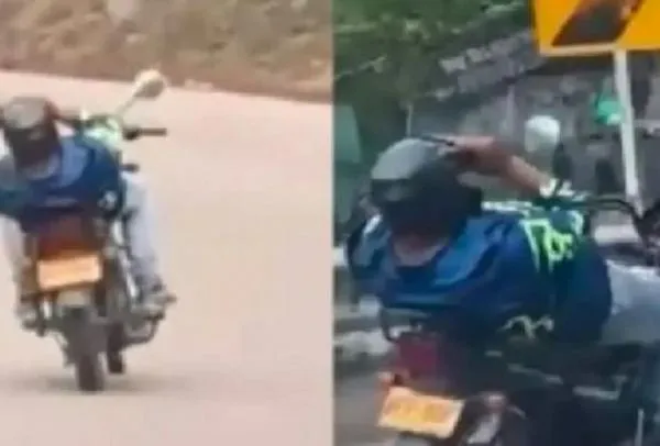 Maniobras de un motociclista al conducir acostado en calles de Bucaramanga