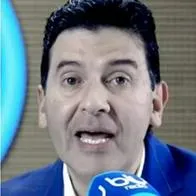 Néstor Morales, director de Blu Radio y Alexánder Vega, registrador nacional. 