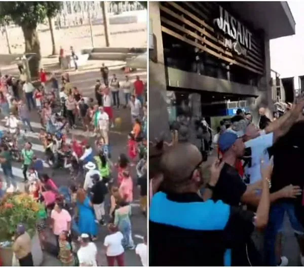 Lluvia de billetes en Pereira desde un edificio: La gente se peleaba por agarrarlos
