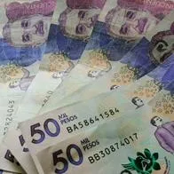 Foto de dinero colombiano, en nota de prima de diciembre en Colombia: cuánto dinero dejará para economía y qué dijeron los expertos