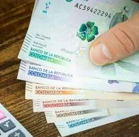 Foto de dinero colombiano, en nota de que Troop, lejos de Bancolombia, Davivienda y más: cómo invertir desde Colombia en inmuebles de EE. UU.