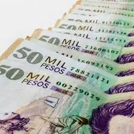 Foto de billetes de 50.000 pesos colombianos