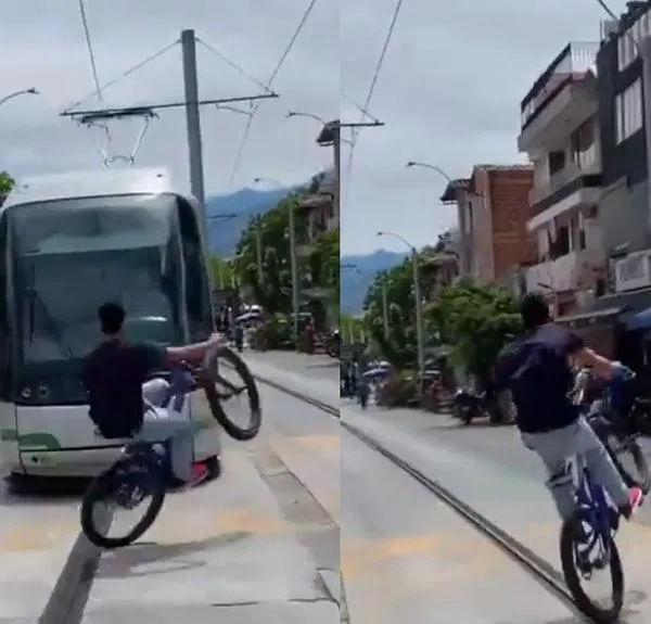 Un imprudente ciclista desata caos en Medellín al realizar peligrosas acrobacias, casi colisionando con el tranvía de la ciudad.